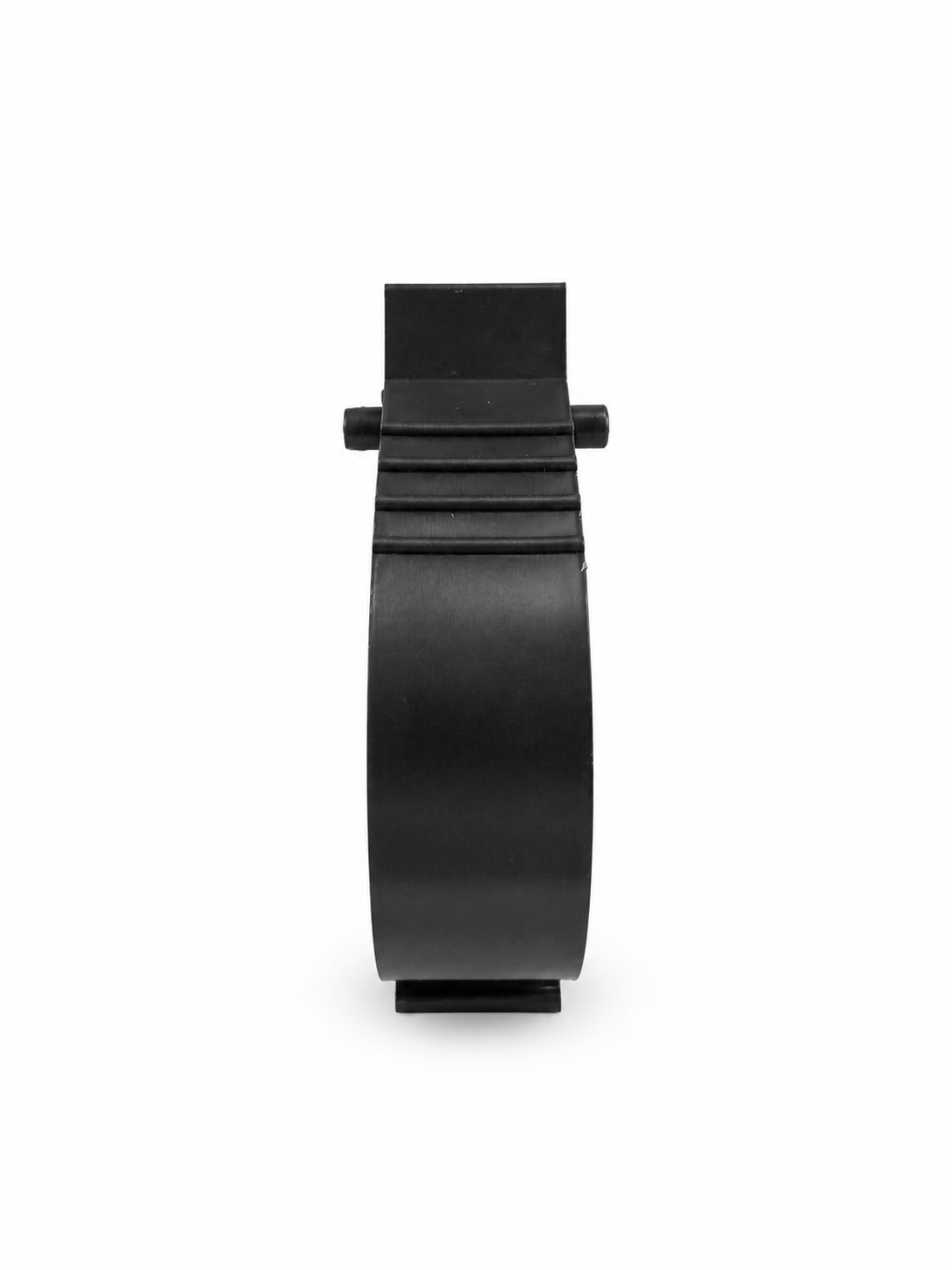 The Toy Clip shown attached to a belt, holding a toy