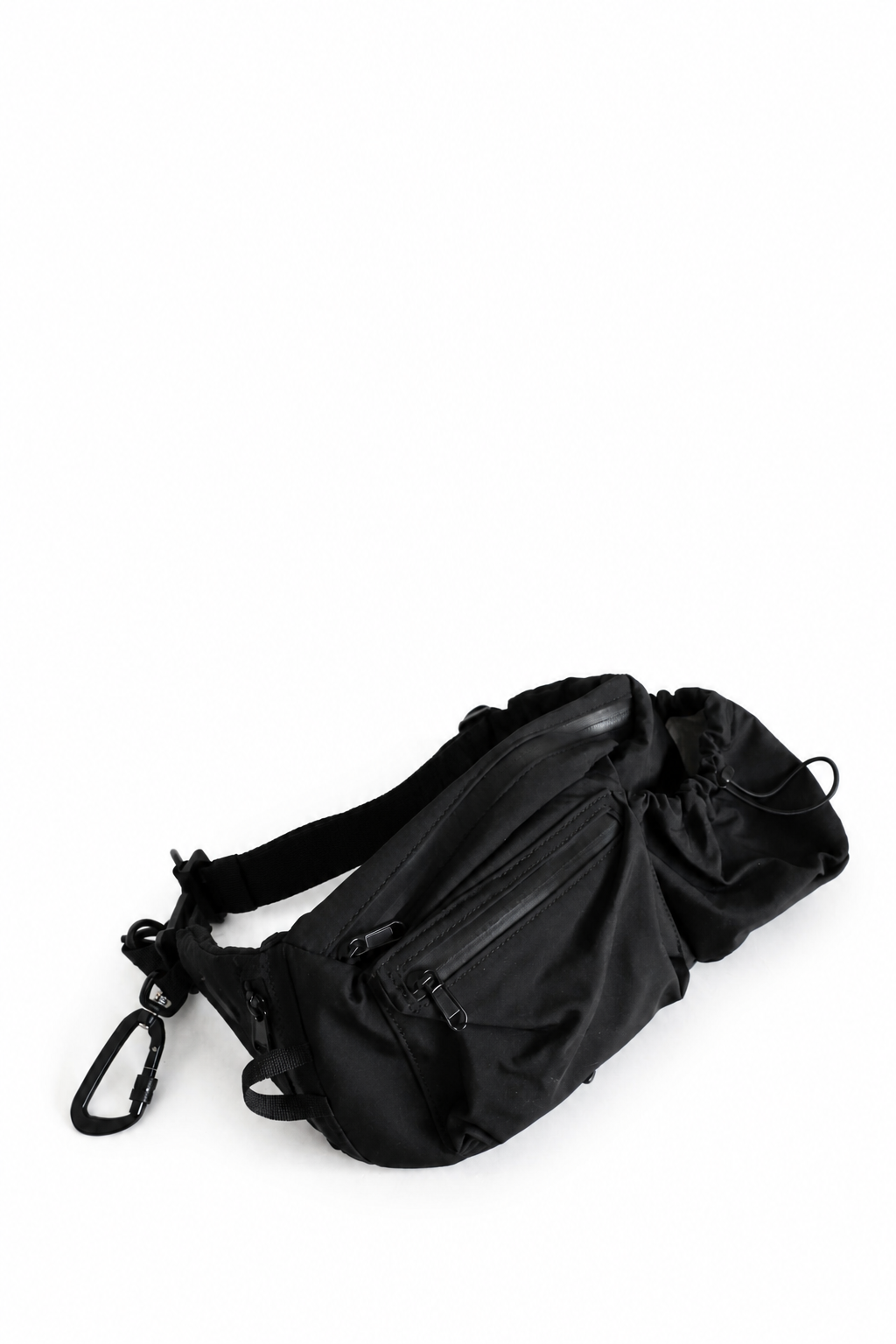 The Adventure Pouch 2.0 shown from the side, showing its zip pockets and strap hardware