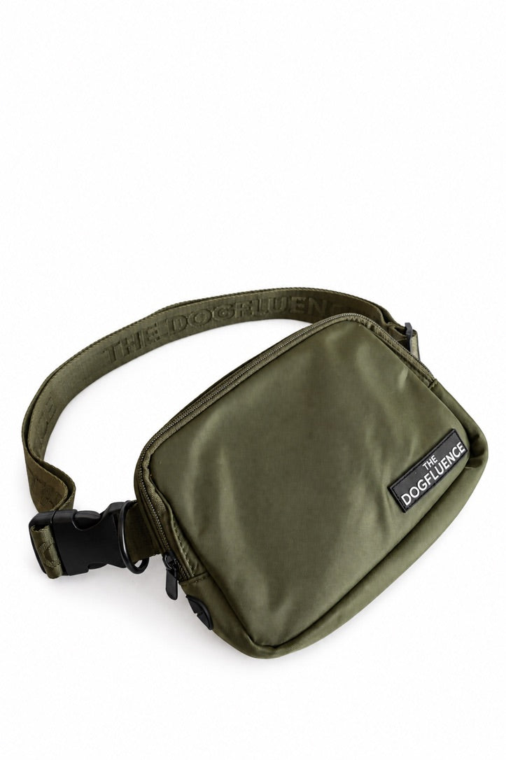 The Mini Pouch in Ango, an olive green, front view with its adjustable strap and quick-release buckle